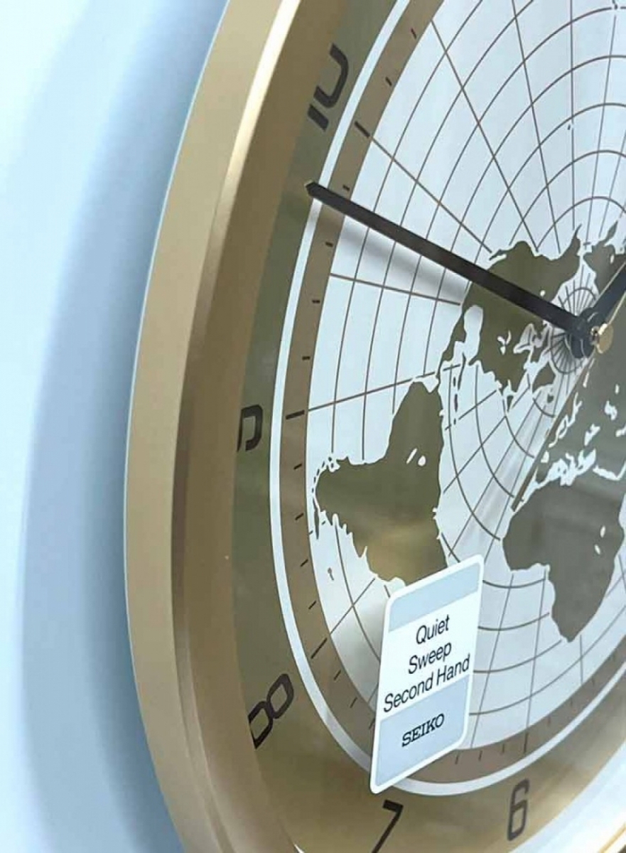 Настенные часы Seiko QXA814G с картой мира