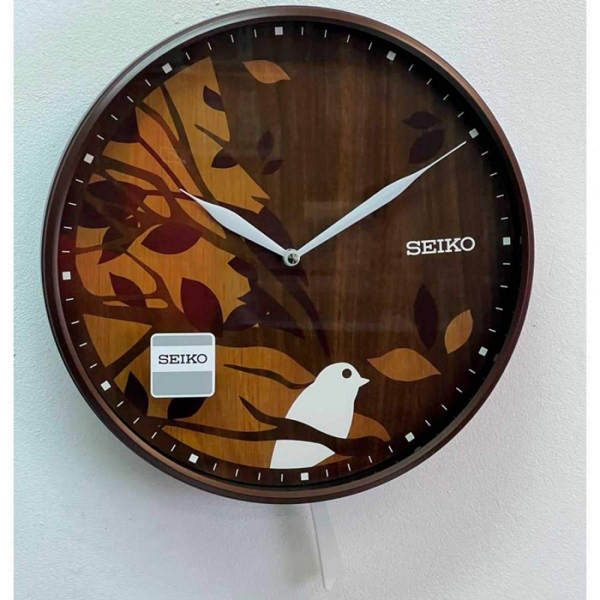 Настенные часы Seiko QXC243B с маятником в виде хвоста птицы